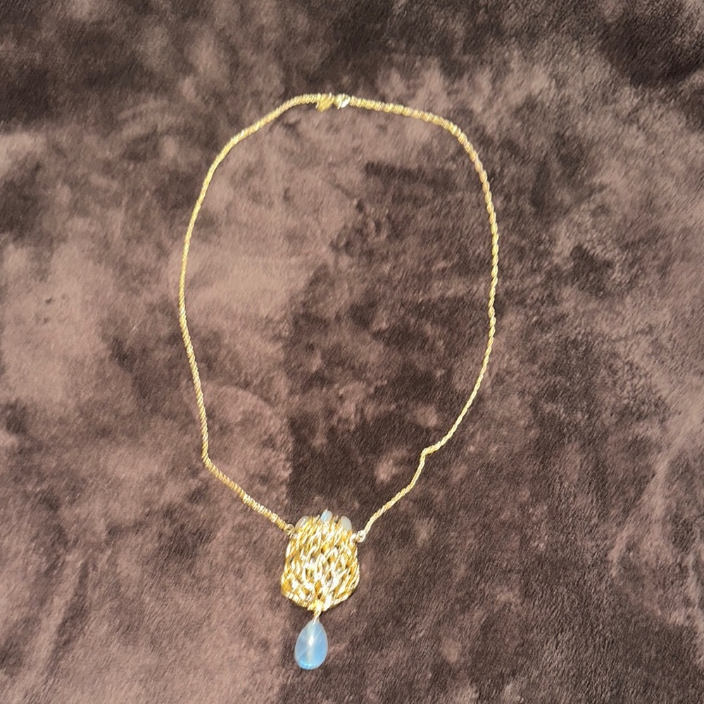 Elegant Alexis Bittar: Gold Tone, Long Purse Necklace with Blue Pendant.